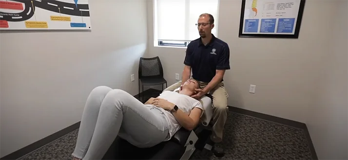 Brian Tolman Adjusting A Patient.